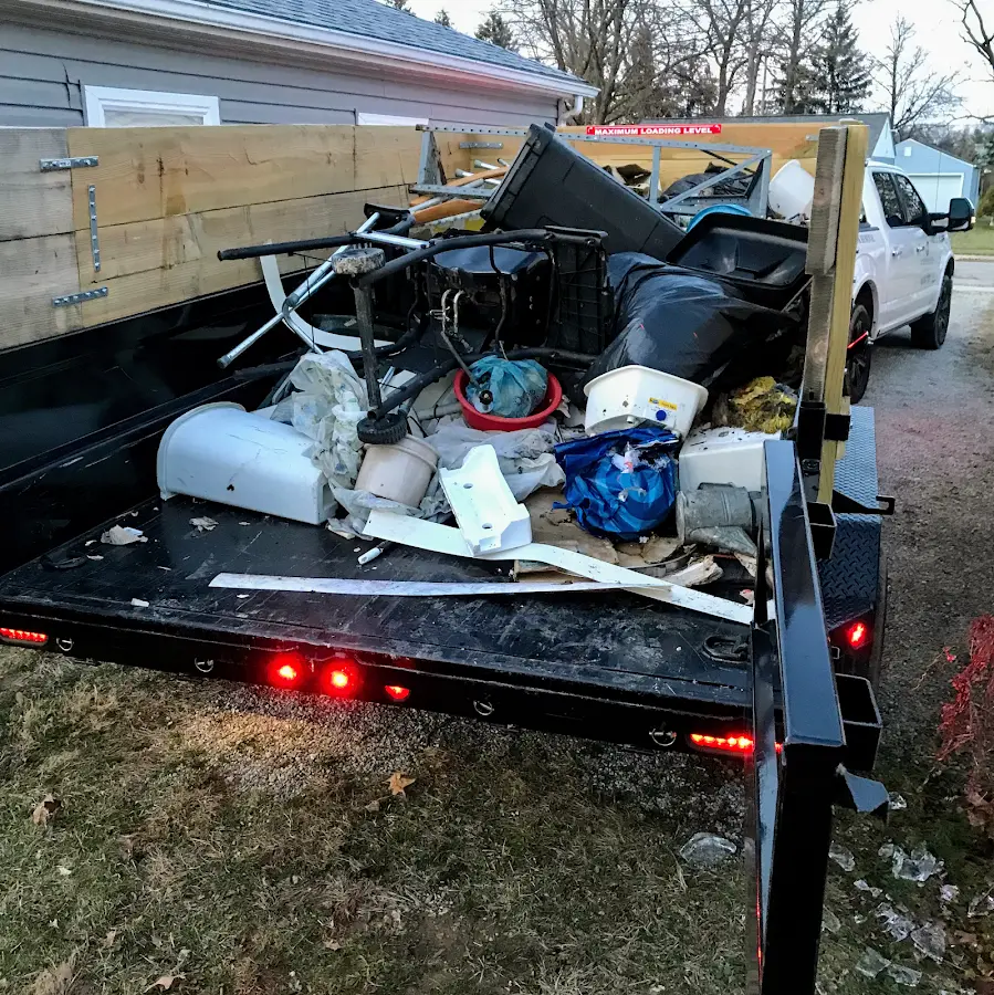 Roll-off dumpster delivered to a residential driveway in Dent